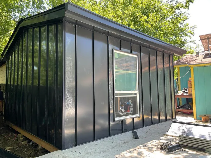 Black standing seam metal wall panels for Roof Inspection in Teaneck