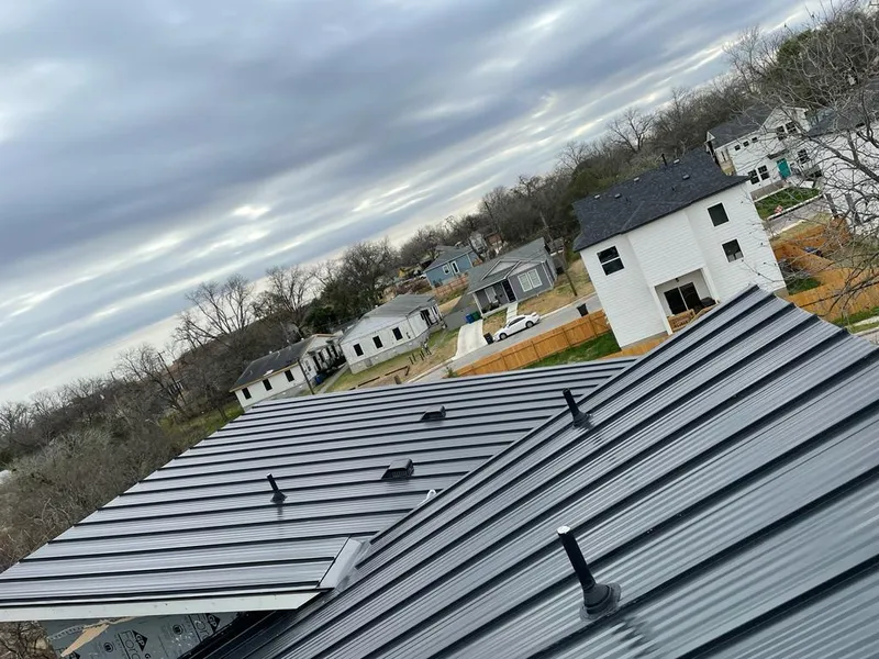 Standing seam metal roof panels with vents for Skylight Repair in Teaneck